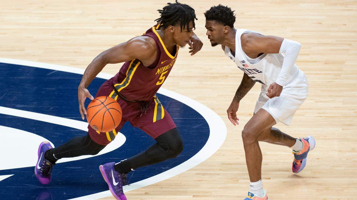 Penn State Nittany Lions guard Jamari Wheeler (5) defends Minnesota Golden Gophers guard Marcus Carr (5) during an NCAA college basketball game Wednesday, March 3, 2021, in University Park, Pa.