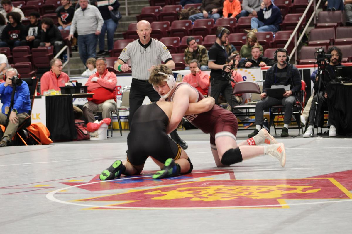 State College’s Nick Pavlechko controls Central Bucks West’s Carl DiGiorgio in their 215-pound consolation finals match of the PIAA Class 3A Championships on Saturday, March 12, 2022 at Giant Center in Hershey. Pavlechko picked up a 10-2 major decision for the bronze medal.