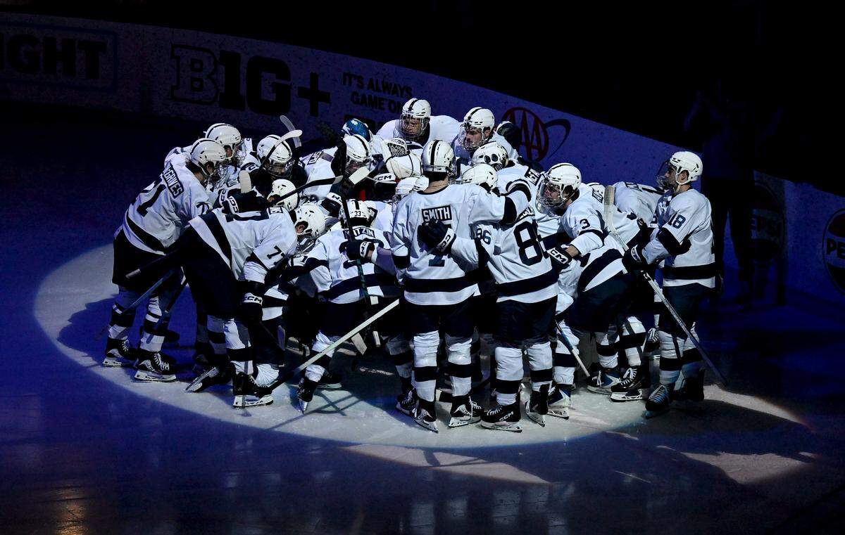 The Penn State men’s hockey team huddles before the game against Minnesota on Friday, Jan. 9, 2026 at Pegula Ice Arena.