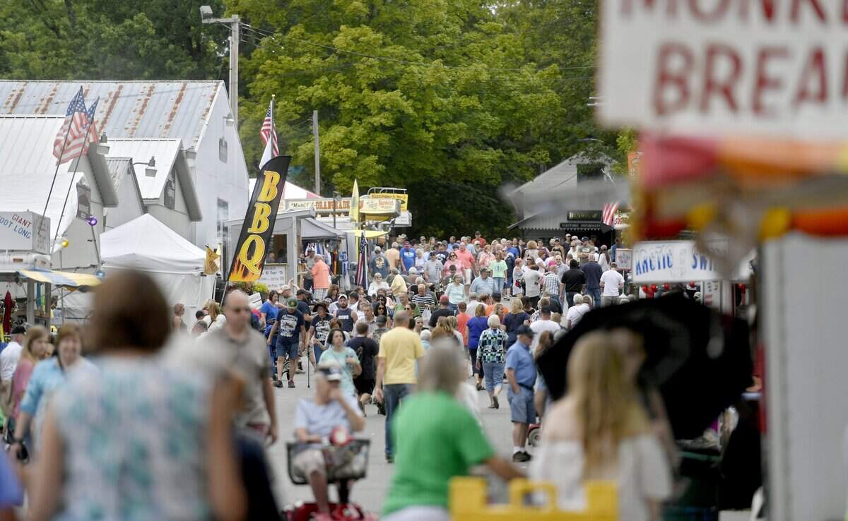 Fairgoers look for something to eat after the parade at the Centre County Grange Encampment and Fair in 2017.