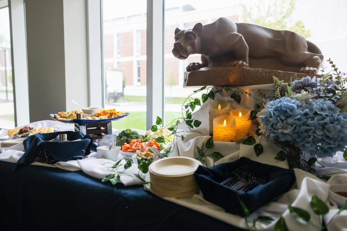 Food is displayed at a reception for the Night of Remembrance inside the Pasquerilla Spiritual Center on Thursday, April 30, 2026. The event was hosted by student government organizations in honor of Penn State students and faculty who died during the 2025-26 school year.
