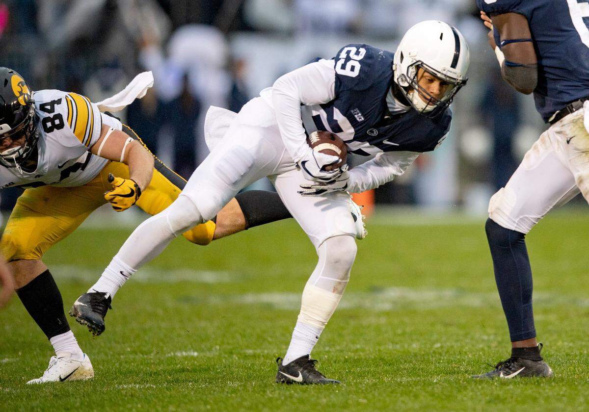 Penn State cornerback John Reid intercepts the ball meant for Iowa wide receiver Nick Easley during the game on Saturday, Oct. 27, 2018.