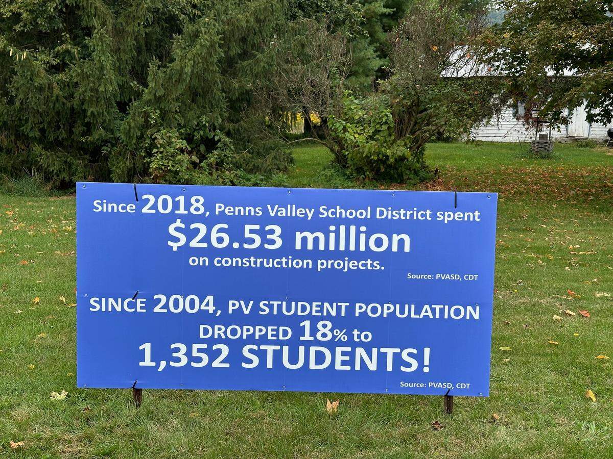 A Penns Valley Town Halls group’s sign voicing concerns about the rising construction costs while student enrollment decreases is pictured.