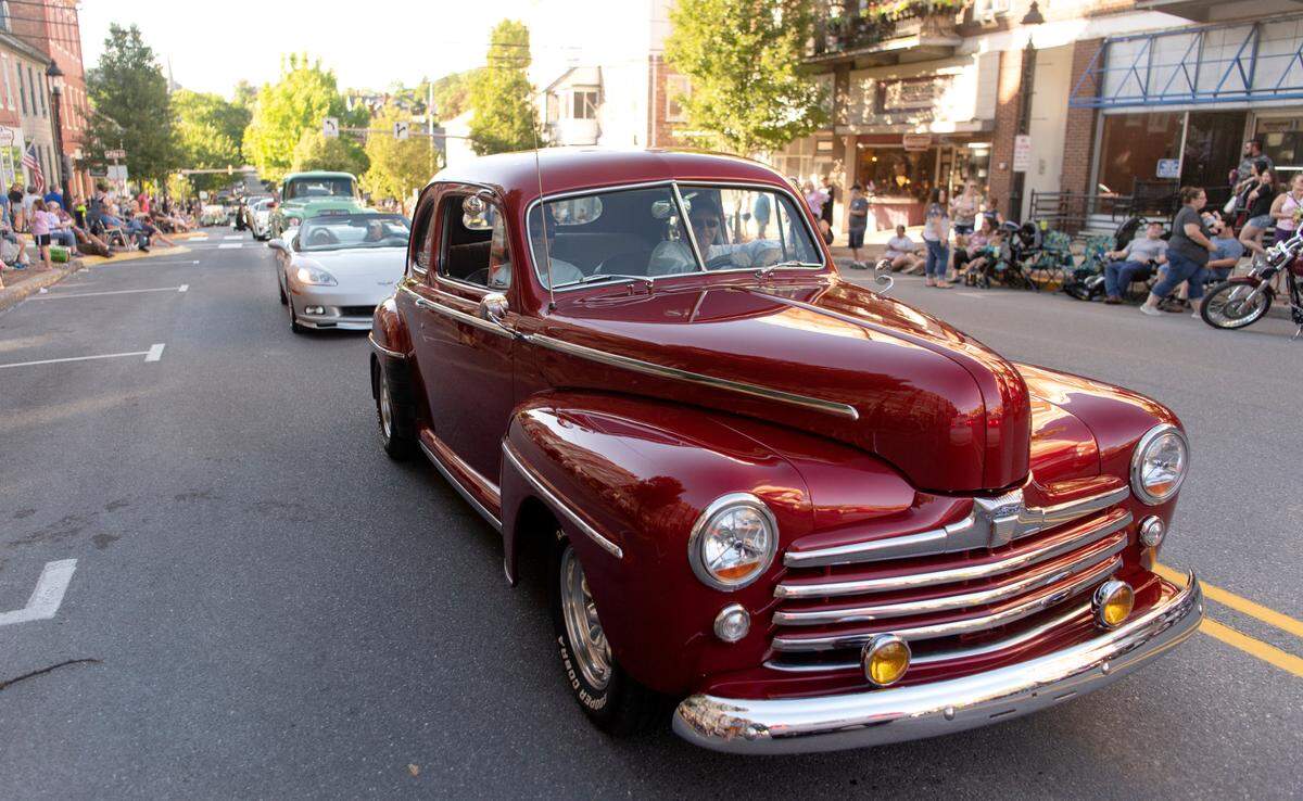 Cars cruise Allegheny street for the Bellefonte Cruise on Friday, June 17, 2022.
