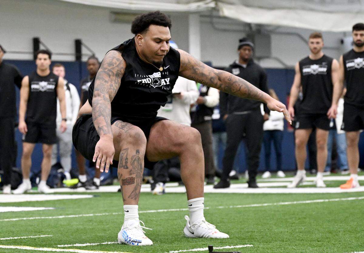 OL Nick Dawkins does the broad jump during Penn State Pro Day on Wednesday, March 18, 2026. His best jump was 9-4.