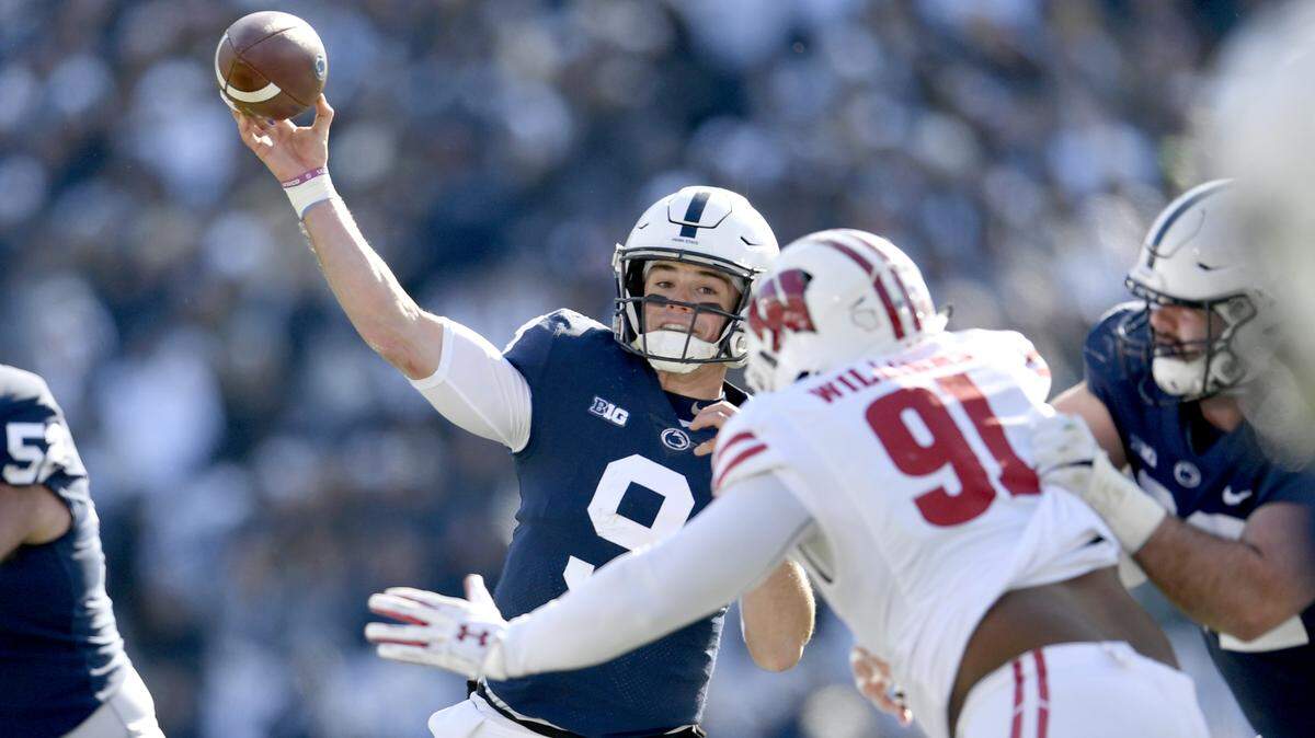 Penn State quarterback Trace McSorley makes a pass for a touchdown in the first quarter of the game against Wisconsin on Saturday, Nov. 10, 2018.  