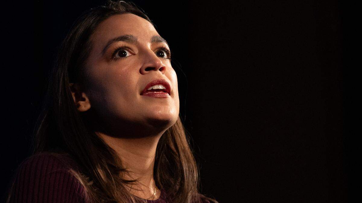 Congresswoman Alexandria Ocasio-Cortez speaks to supporters during a rally at The State Theatre on Friday, Oct. 18, 2024.