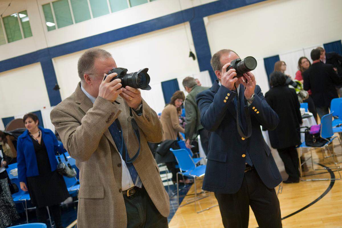 Curt Chandler and John Beale at a graduation reception for December graduates on Dec. 17, 2011.