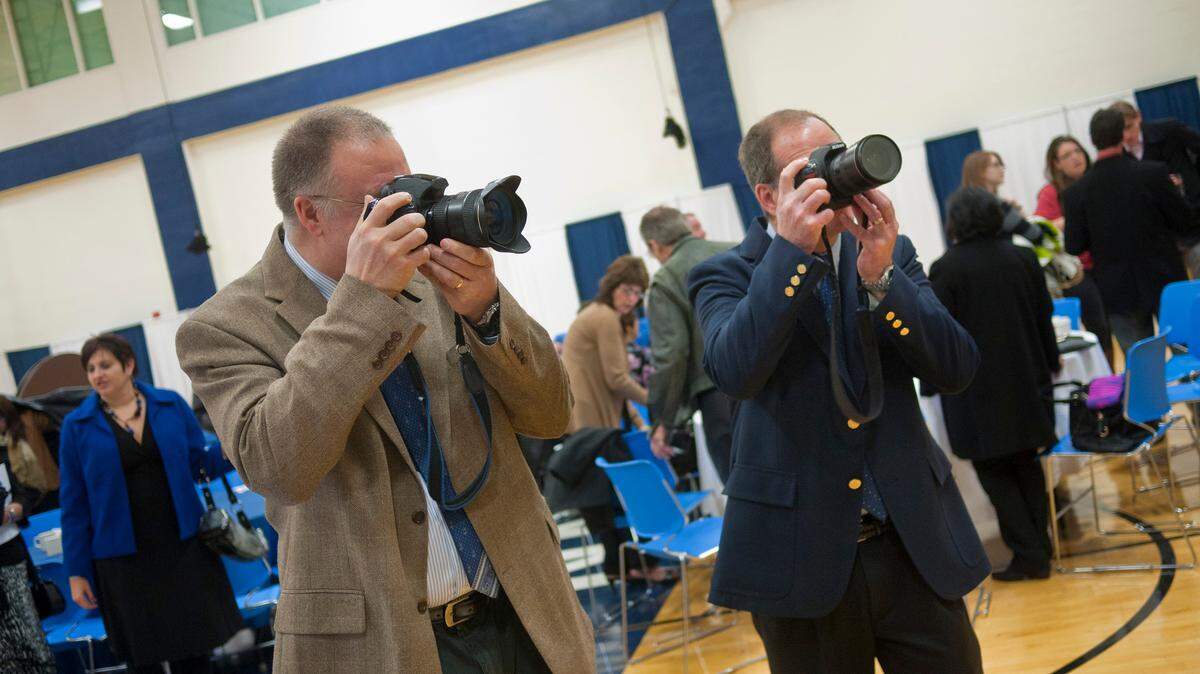Curt Chandler and John Beale at a graduation reception for December graduates on Dec. 17, 2011.