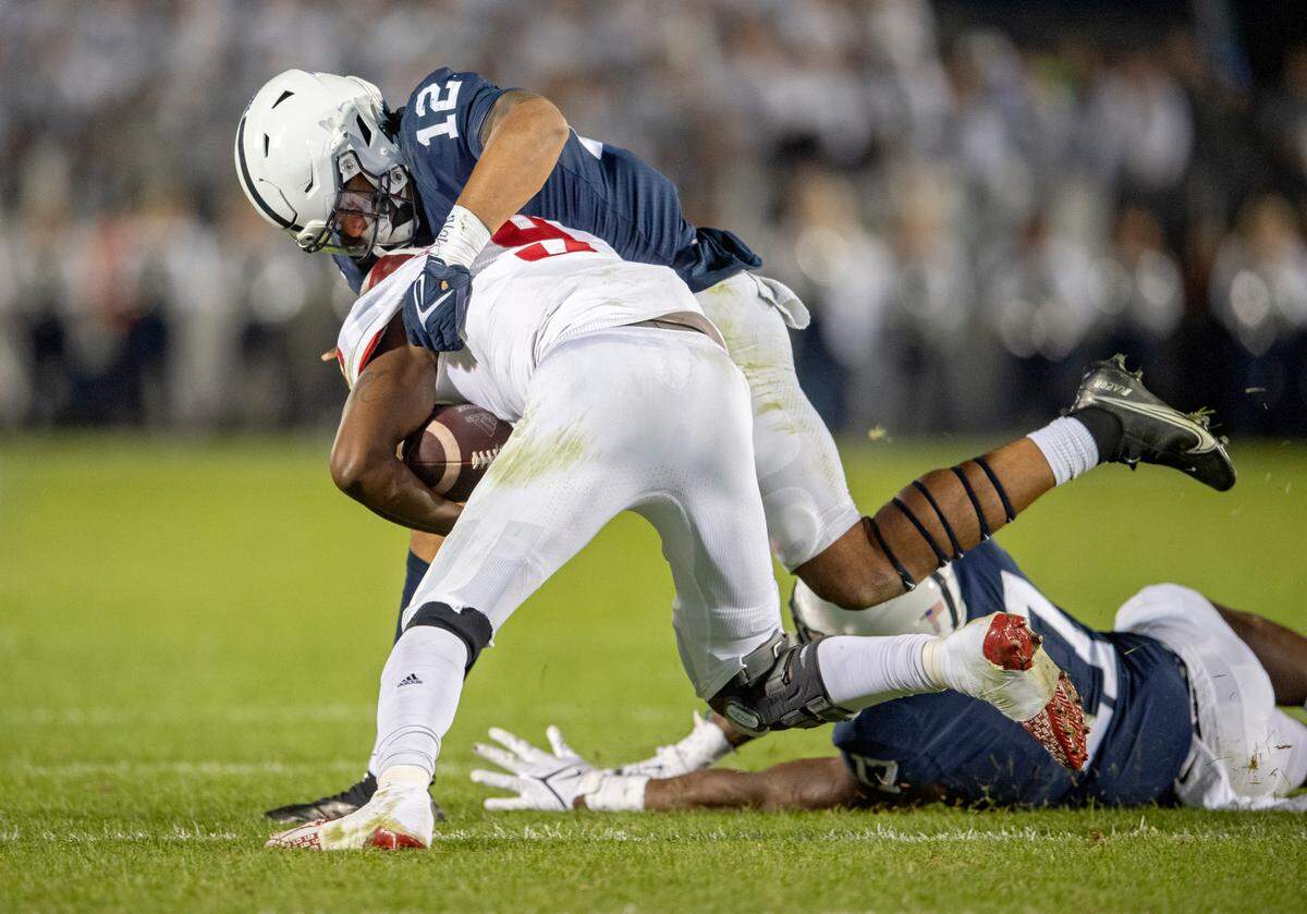 Penn State linebacker Brandon Smith stops Indiana quarterback Michael Penix Jr.