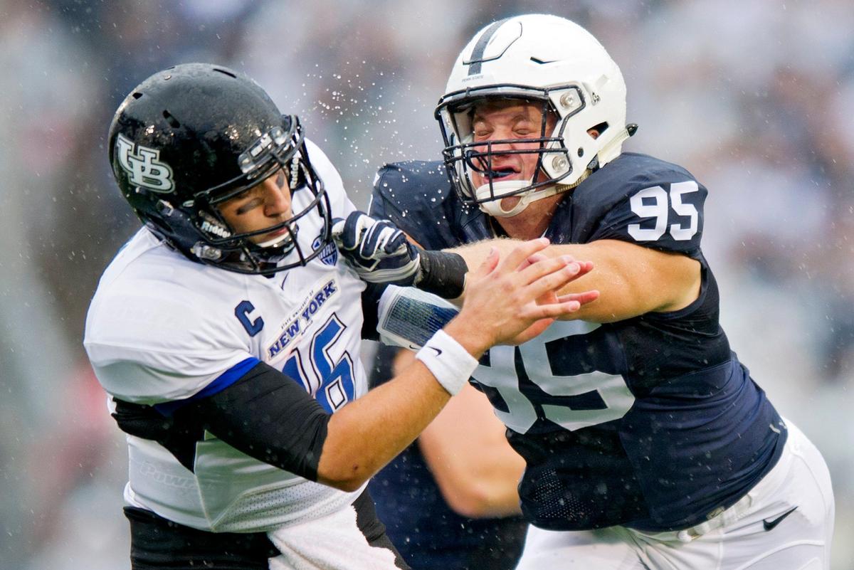 Penn State defensive end Carl Nassib blocks Buffalo’s Joe Licata in a 2015 game.
