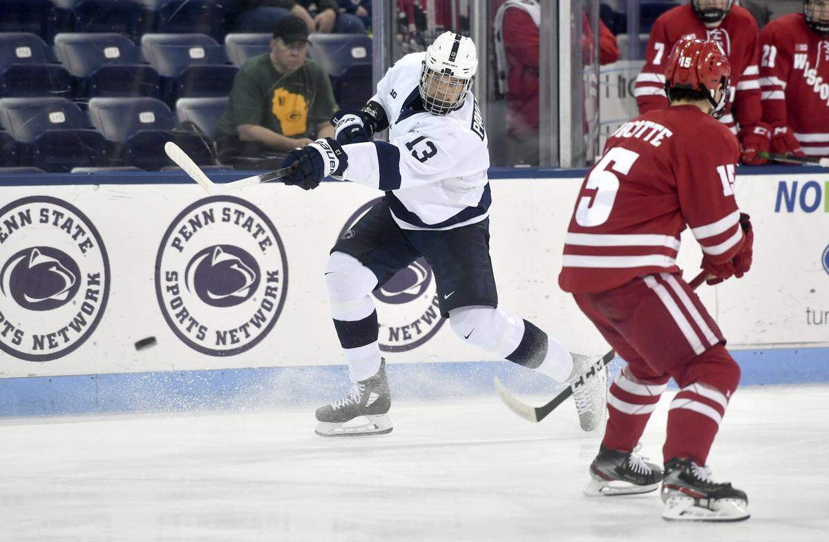 Penn State’s Nikita Pavlychev shoots for the first goal of the game against Wisconsin at Pegula Ice Arena on Thursday, Oct. 31, 2019.