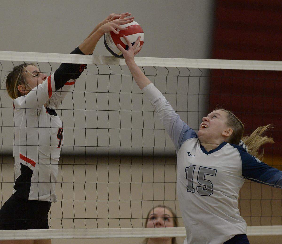 11/06/21 By Gary M. Baranec Central Cambria’s (4) Maddy Kim and Philipsburg-Osceola’s Kalista Butler at the net in the District 6 AA championship match Saturday, Nov. 11, 2021 at the Altoona Area Fieldhouse