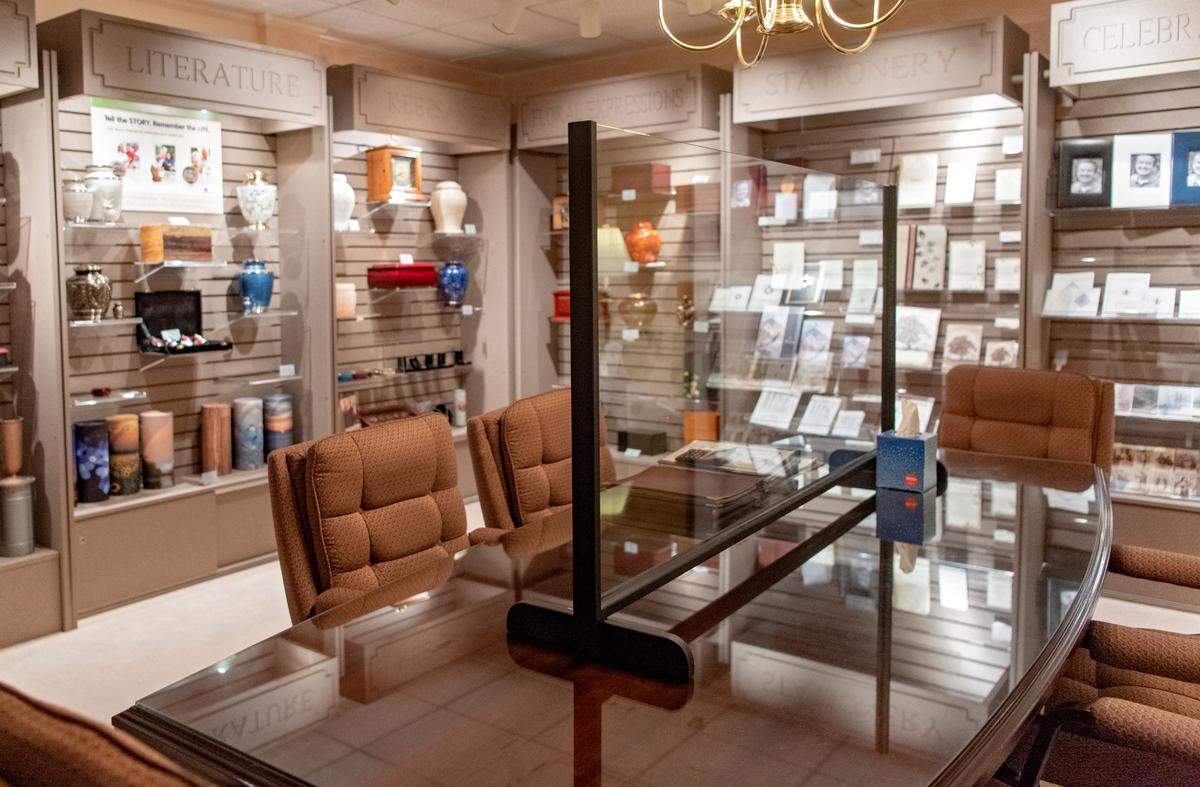 A plexiglass barrier to help keep the funeral directors and grieving families safe at Koch Funeral Home in State College.