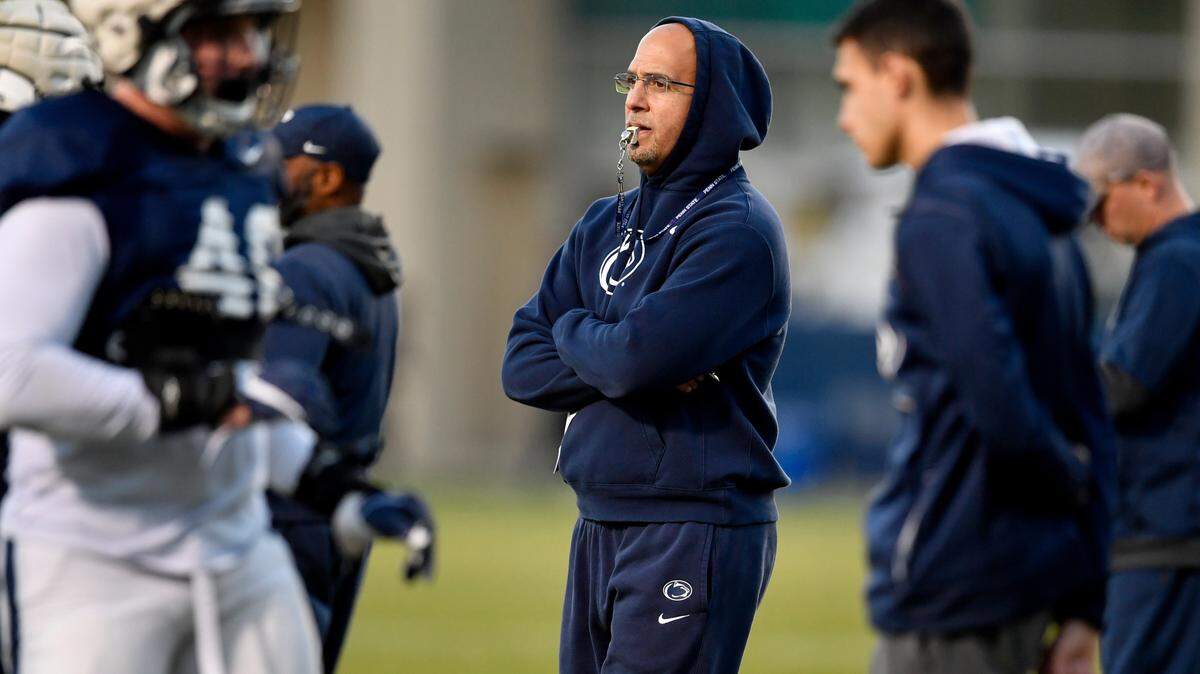 Penn State football coach James Franklin watches the defense run a drill during football practice on Wednesday, Nov. 17, 2021.