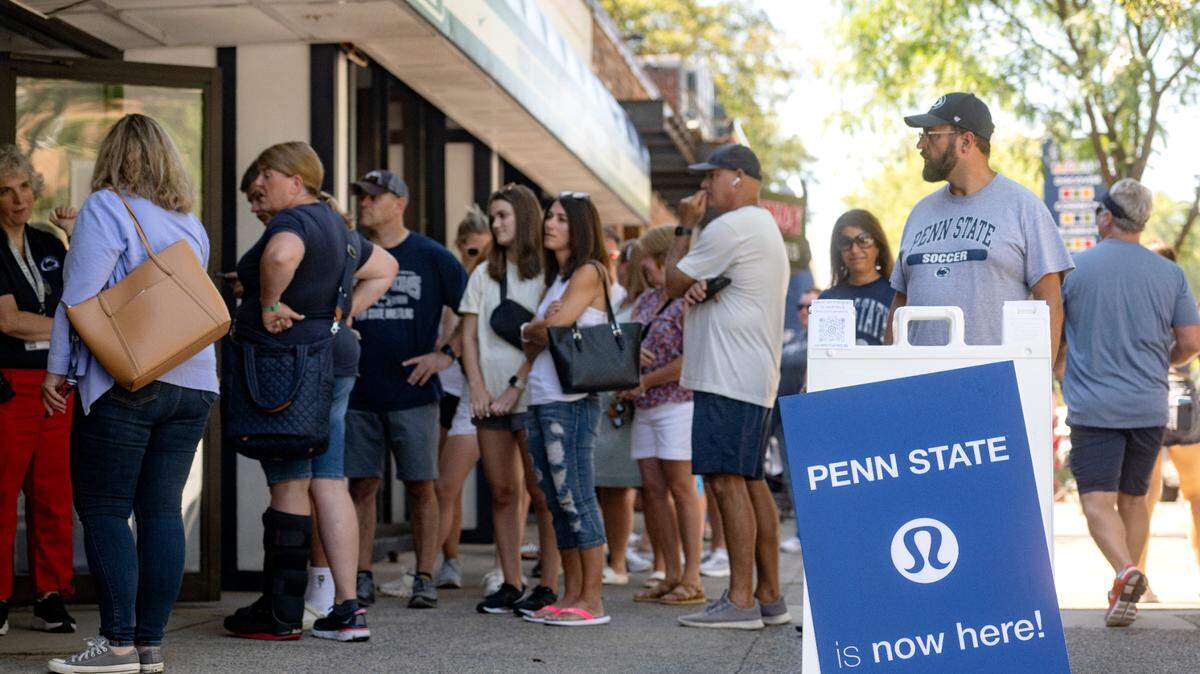 Customers line up outside of Family Clothesline to purchase Lululemon’s Penn State collection on Friday, Aug. 19, 2022.