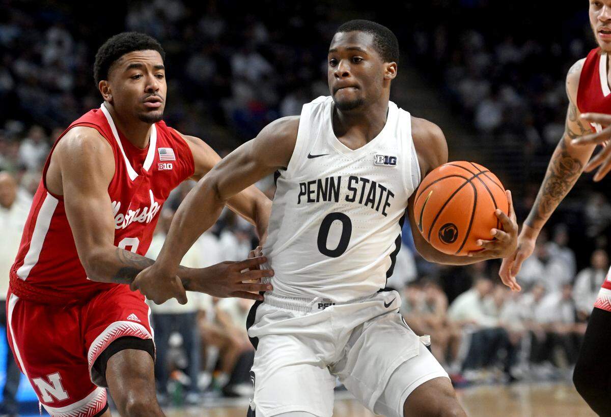 A Nebraska defender can’t stop Penn State’s Kanye Clary as he goes in for a basket during the game on Saturday, Jan. 21, 2023.