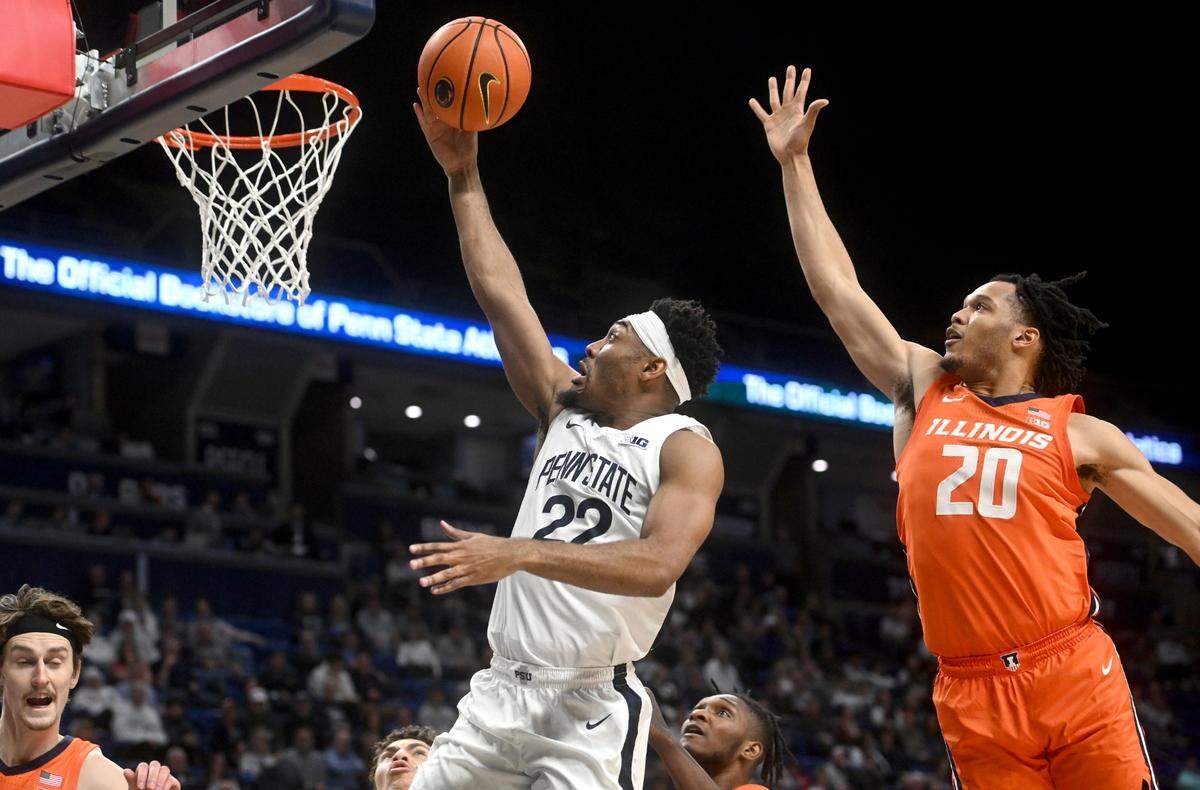 Penn State’s Jalen Pickett goes in for a basket ahead of Illinois’ Ty Rodgers during the game on Tuesday, Feb. 14, 2023.