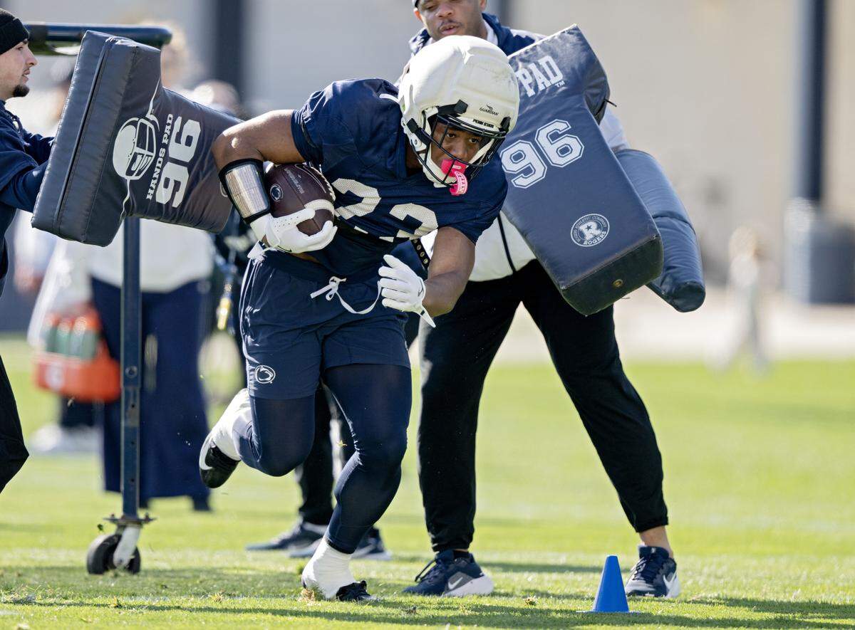 Penn State running back James Peoples runs a drill during practice on Thursday, April 9, 2026.  