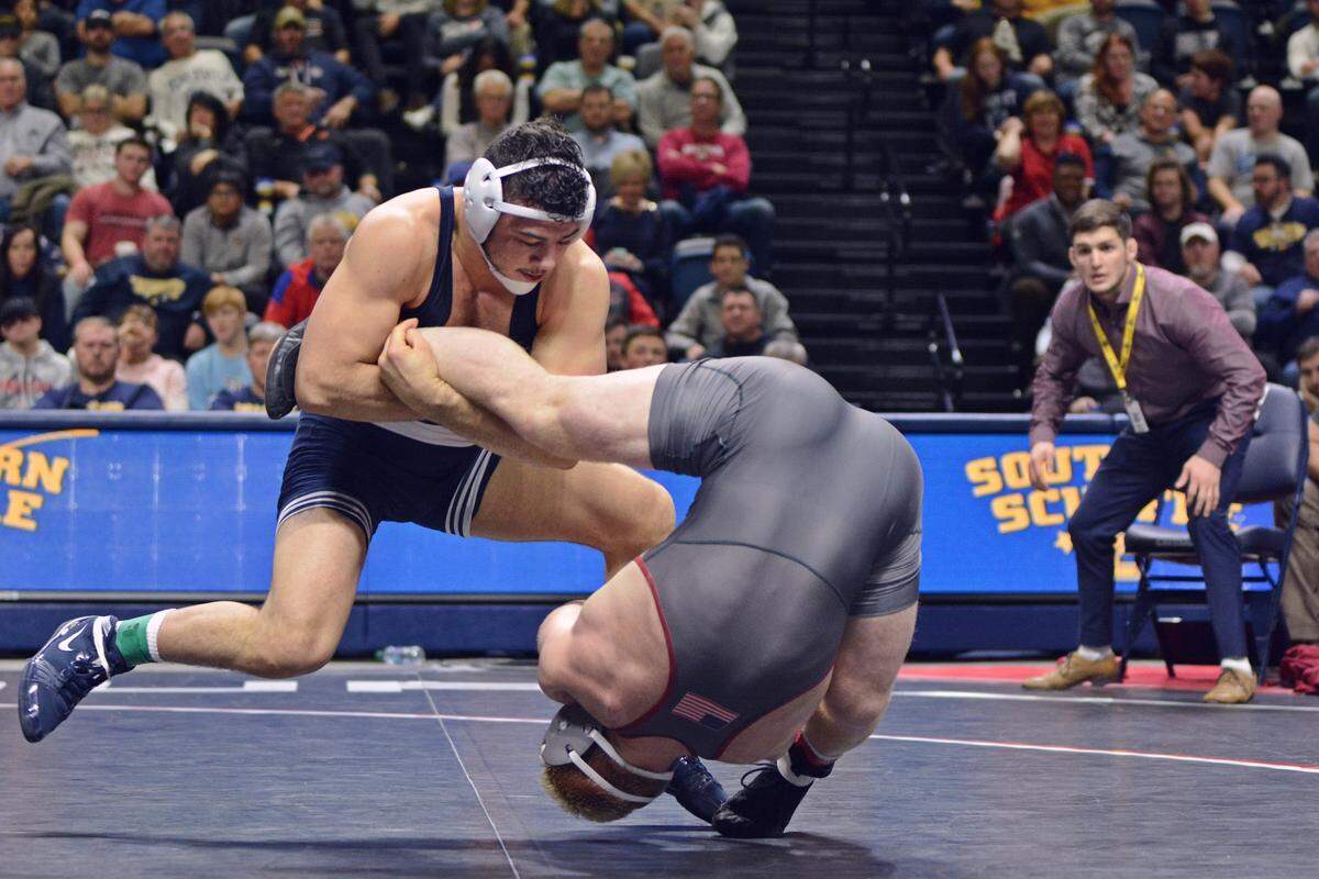 Penn State’s Vincenzo Joseph scrambles with Lock Haven’s Chance Marsteller in their 165-pound final of the Southern Scuffle on Wednesday in Chattanooga, Tenn. Joseph edged Marsteller 6-5.