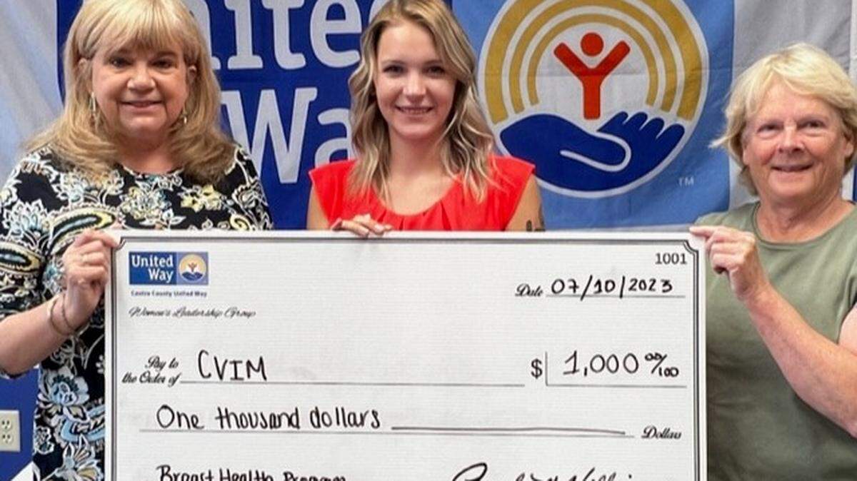 Centre County United Way Executive Director Paula Williams, left, Centre Volunteers in Medicine Marketing Coordinator Darion Shawley and Women United Chair Barbara Sherlock pose in July 2023 after CVIM was awarded a 1,000 grant. Williams is set to become CVIM’s next director.