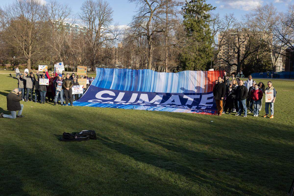 About 50 people attended a climate rally held on Monday, March 24, 2025 on the HUB lawn.