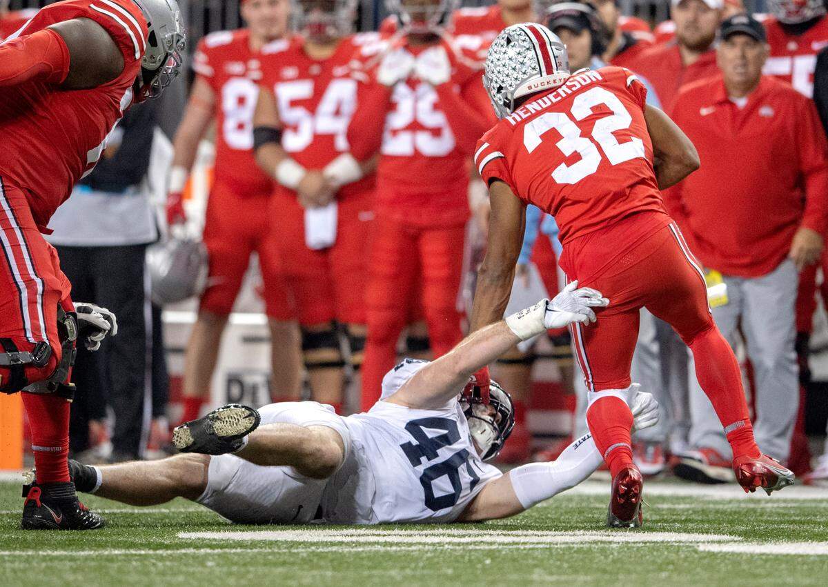 Penn State defensive end Nick Tarburton can’t stop Ohio State running back TreVeyon Henderson during the game on Saturday, Oct. 30, 2021 at Ohio Stadium.