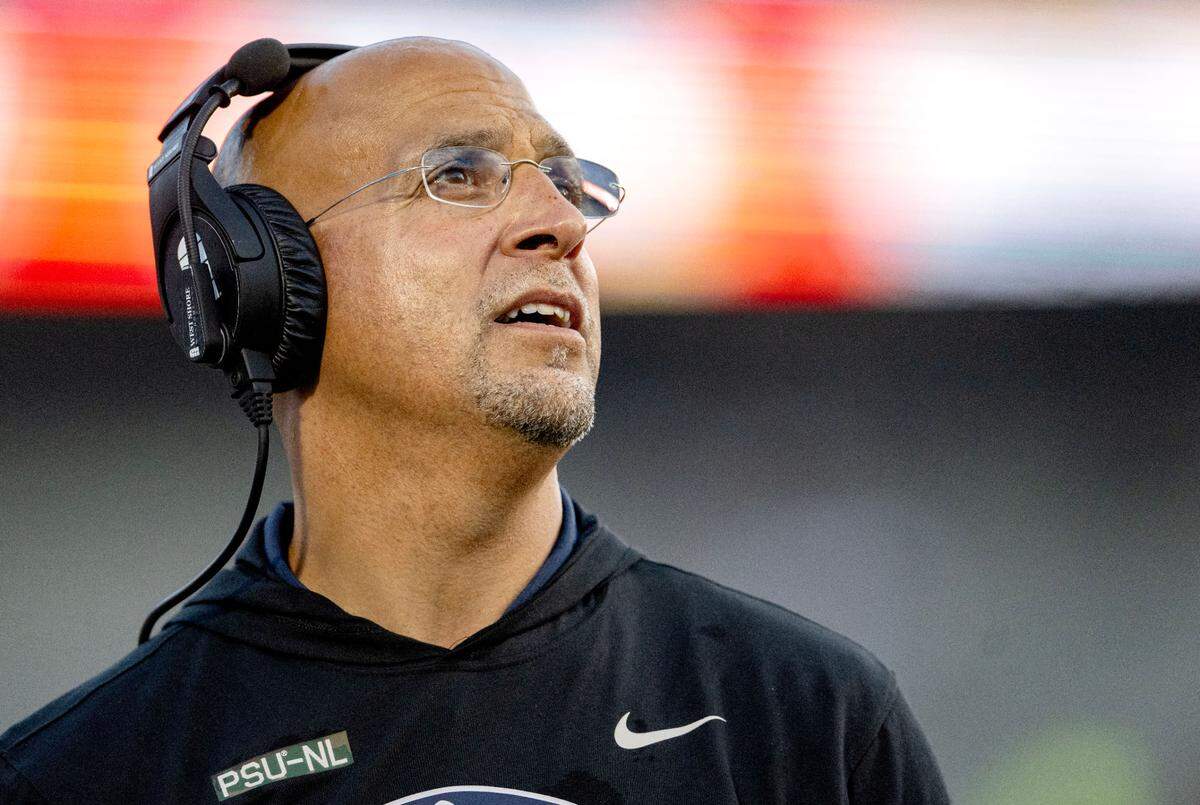 Penn State football coach James Franklin looks to the replay during the game against Kent State on Saturday, Sept. 21, 2024 at Beaver Stadium.