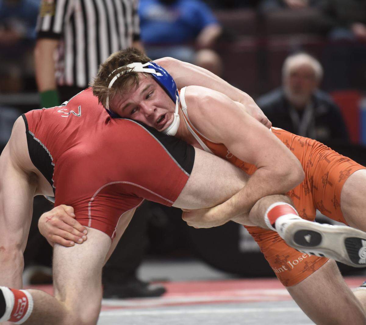 St. Joseph’s Catholic Acadmey’s Tyler Stoltzfus looks for a takedown on Saucon Valley’s Matthew Arciuolo in the 170-pound PIAA Championship finals match. Stoltzfus won 1-0 to be one of three Centre County wrestlers to claim gold.