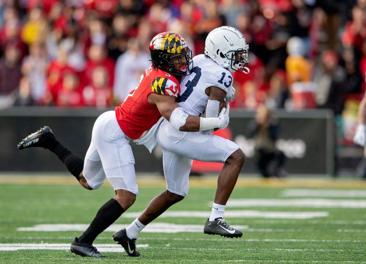 A Maryland defender tries to stop Penn State wide receiver KeAndre Lambert-Smith during the game on Saturday, Nov. 6, 2021.