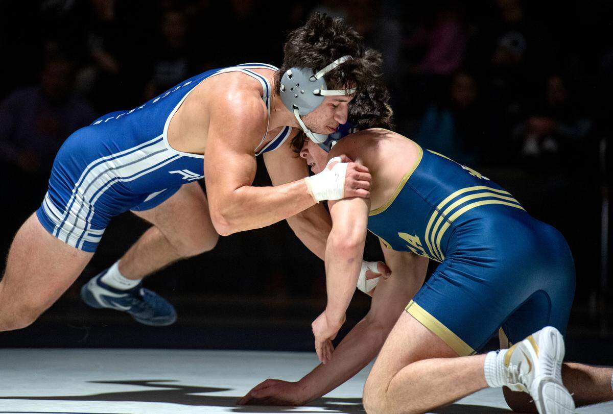 Penns Valley’s Cole Felker wrestles Bald Eagle Area’s Caleb Close in the 172 lb bout of the match on Wednesday, Jan. 12, 2022.