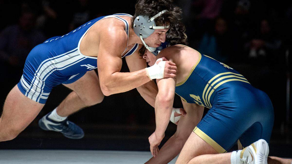 Penns Valley’s Cole Felker wrestles Bald Eagle Area’s Caleb Close in the 172 lb bout of the match on Wednesday, Jan. 12, 2022.  