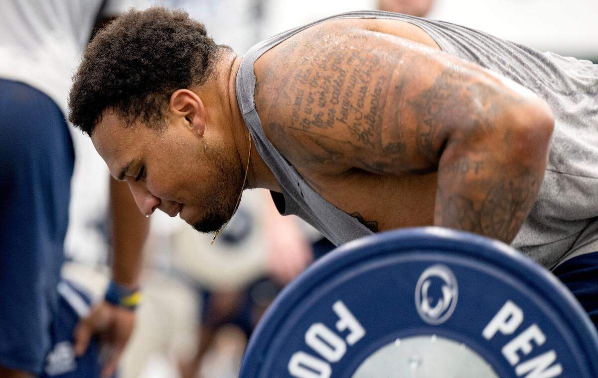 Penn State offensive lineman Nick Dawkins lifts during a summer strength session on Monday, July 14, 2025 in the Lasch Building.