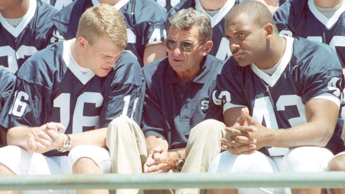Joe Paterno with Brandon Short, right, on Media Day on August 6, 1999.