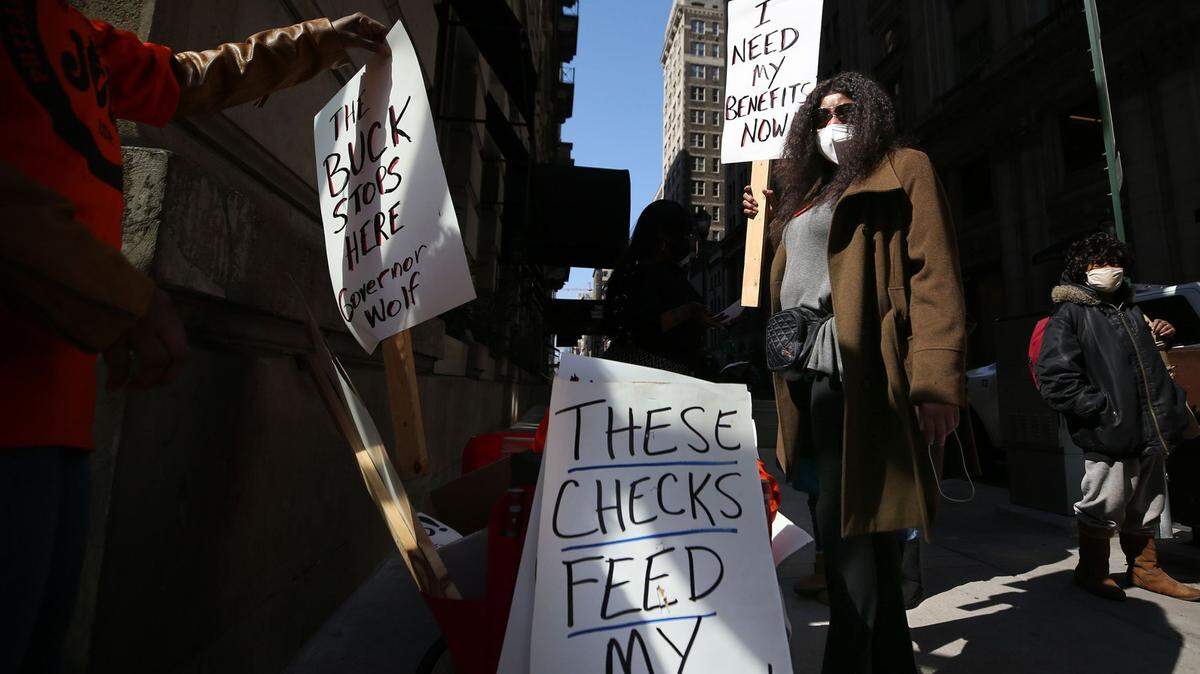 Michelle Perry of Philadelphia protested outside Gov. Tom Wolf’s Center City office earlier this month, demanding “a working unemployment system to provide timely responses and benefits to unemployed workers.”