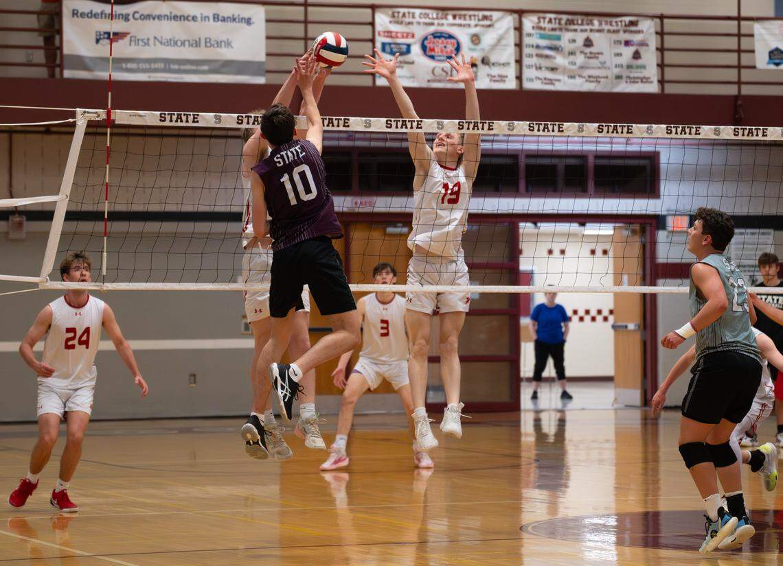State High attempts to hit the ball past defenders during a volleyball game against Cumberland Valley in State College, Pa., on Tuesday, April 14, 2026. The Eagles defeated the Little Lions 3-1.