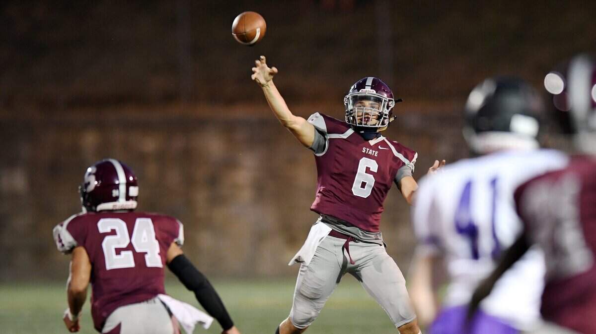 State College quarterback Jaden Seider makes a pass during a game against Mifflin County Friday, Aug. 24, 2018 at Memorial Field.