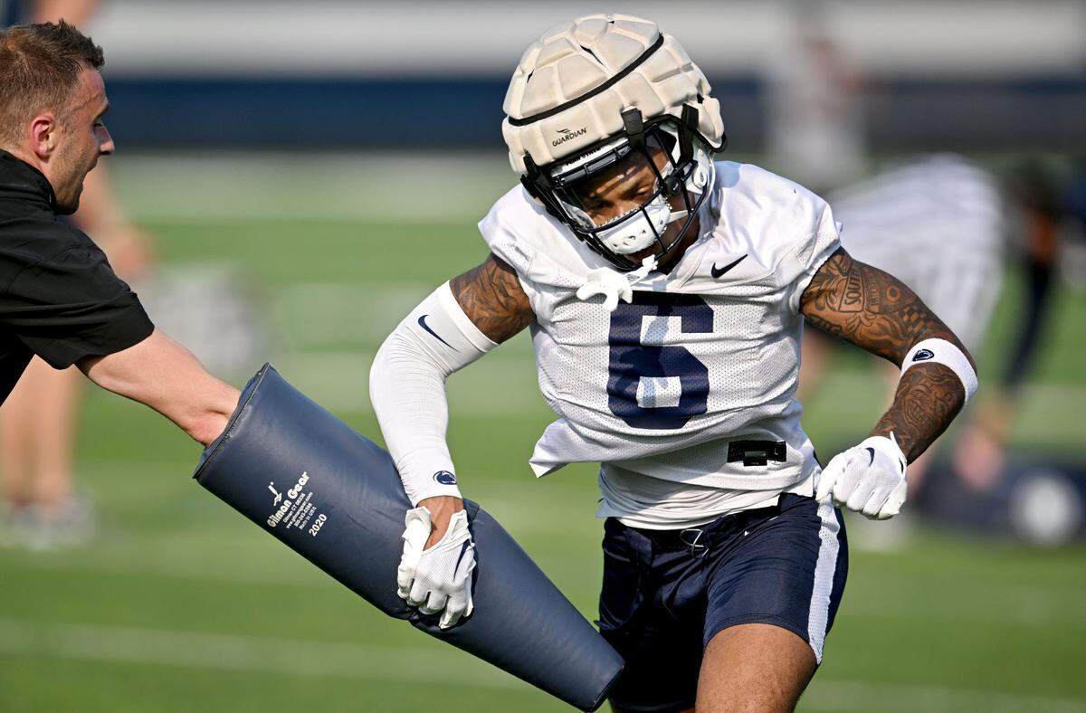 Penn State wide receiver Harrison Wallace III runs a drill at practice on Wednesday, July 31, 2024.