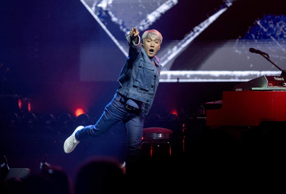 Arnel Pineda of Journey points to the crowd during the performance at the Bryce Jordan Center as part of their Final Frontier Tour on Wednesday, May 27, 2026.  