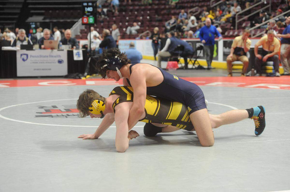 Bald Eagle Area’s Caleb Close controls Titusville’s Brock Covell in their 172-pound second round match of the PIAA Class 2A Championships on Thursday, March 10, 2022 at Giant Center in Hershey. Close edged Covell, 1-0.