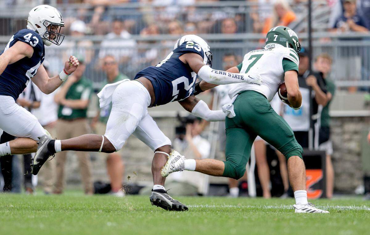 Penn State linebacker Curtis Jacobs reaches for Ohio’s Kurtis Rourke during the game on Saturday, Sept. 10, 2022.