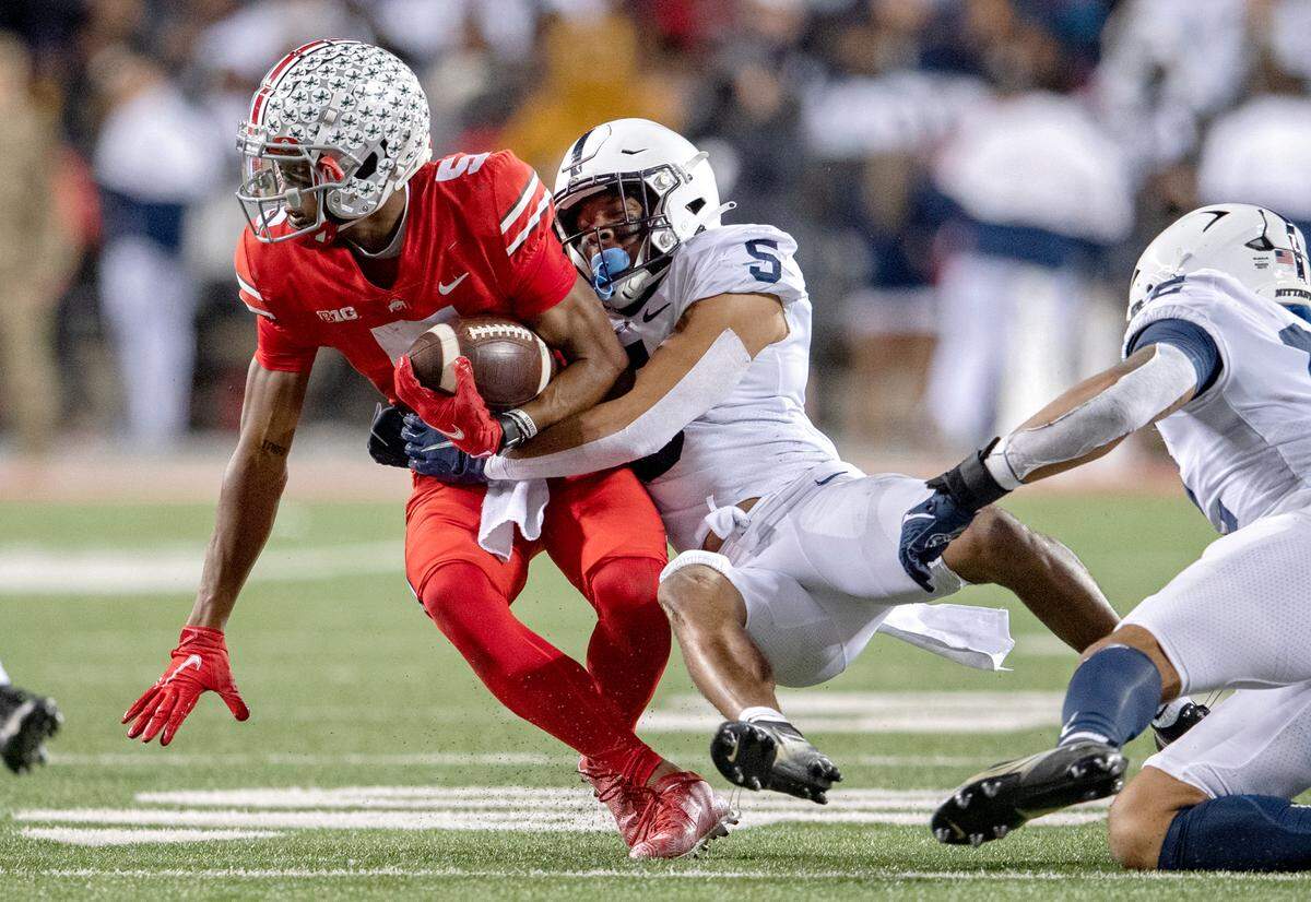 Penn State cornerback Tariq Castro-Fields stops Ohio State wide receiver Garrett Wilson during the game on Saturday, Oct. 30, 2021 at Ohio Stadium.