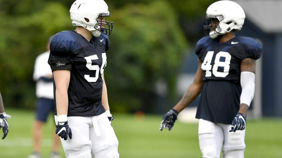 Penn State defensive tackle Robert Windsor and defensive end Shareef Miller look for directions during practice on Tuesday, August 21, 2018.   