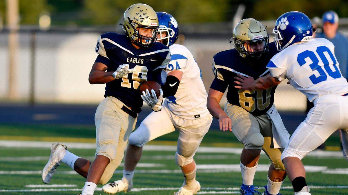 Bald Eagle Area’s Camron Watkins cuts down the field with the ball and and scores a touchdown during the game against North Penn-Mansfield on Friday, Sept. 10, 2021. Bald Eagle Area won, 50-7.