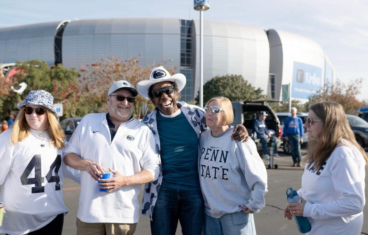 Penn State fans outside tailgate outside of State Farm Stadium before the Fiesta Bowl on Tuesday, Dec. 31, 2024.