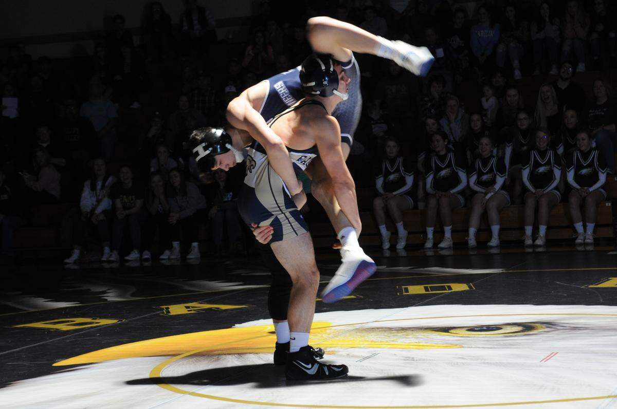 Bald Eagle Area’s Gage McClenahan looks for a safe takedown on Philipsburg-Osceola’s Austin Foster in their 145-pound bout during the Eagles’ 45-26 win on Thursday. McClenahan pinned Foster in :28.