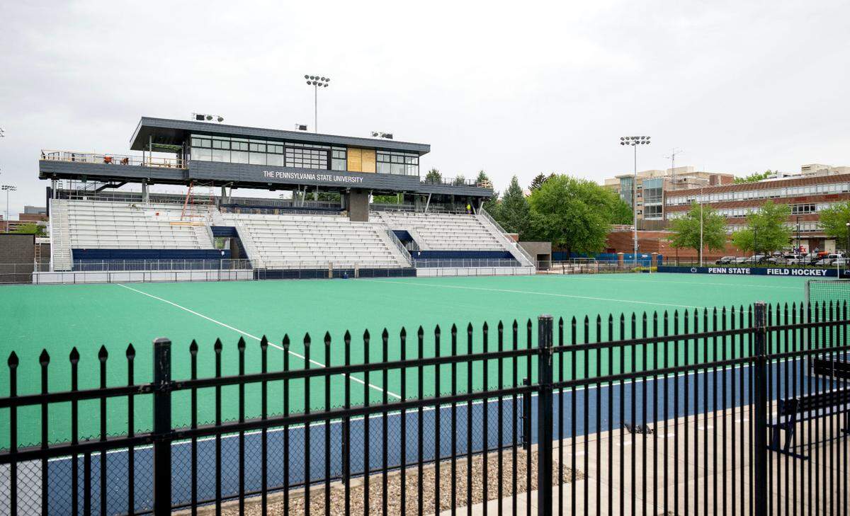 Construction crews work on the new locker rooms, bleachers and press box at the Penn State field hockey stadium on Thursday, May 9, 2024.