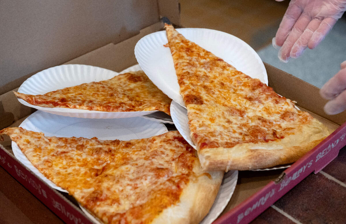 Three slices of 28-inch pizza in a to-go box Benny Leone’s on Wednesday, June 4, 2025.