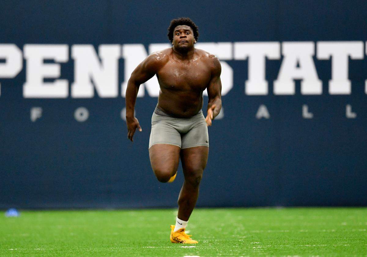 Defensive tackle Derrick Tangelo runs the 40 yard dash during Penn State pro day on Thursday, March 24, 2022.