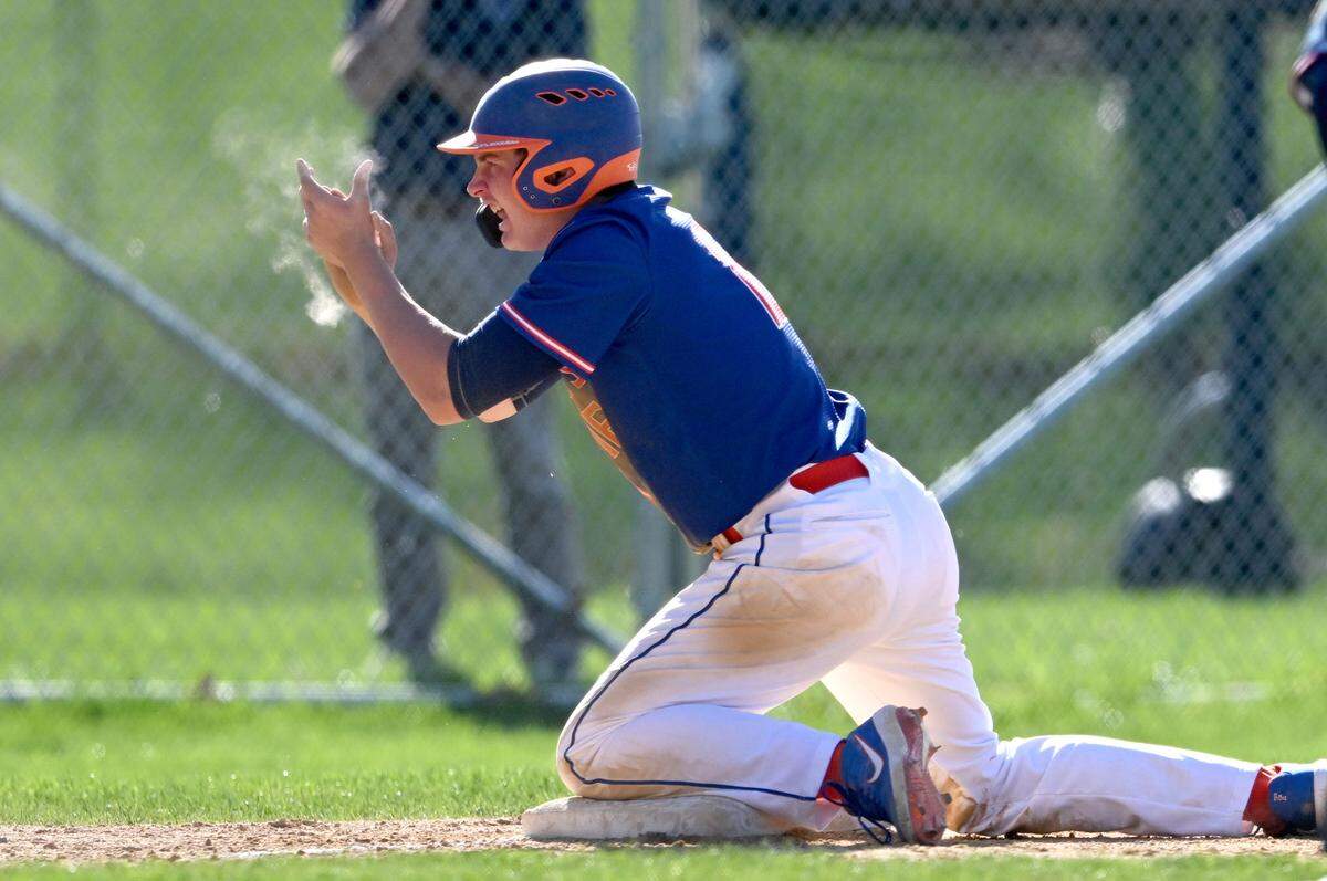 Saint Joseph’s Catholic Academy’s Luke Duckworth celebrates his triple that scored two runs during the game against Susquenita on Wednesday, April 19, 2023.